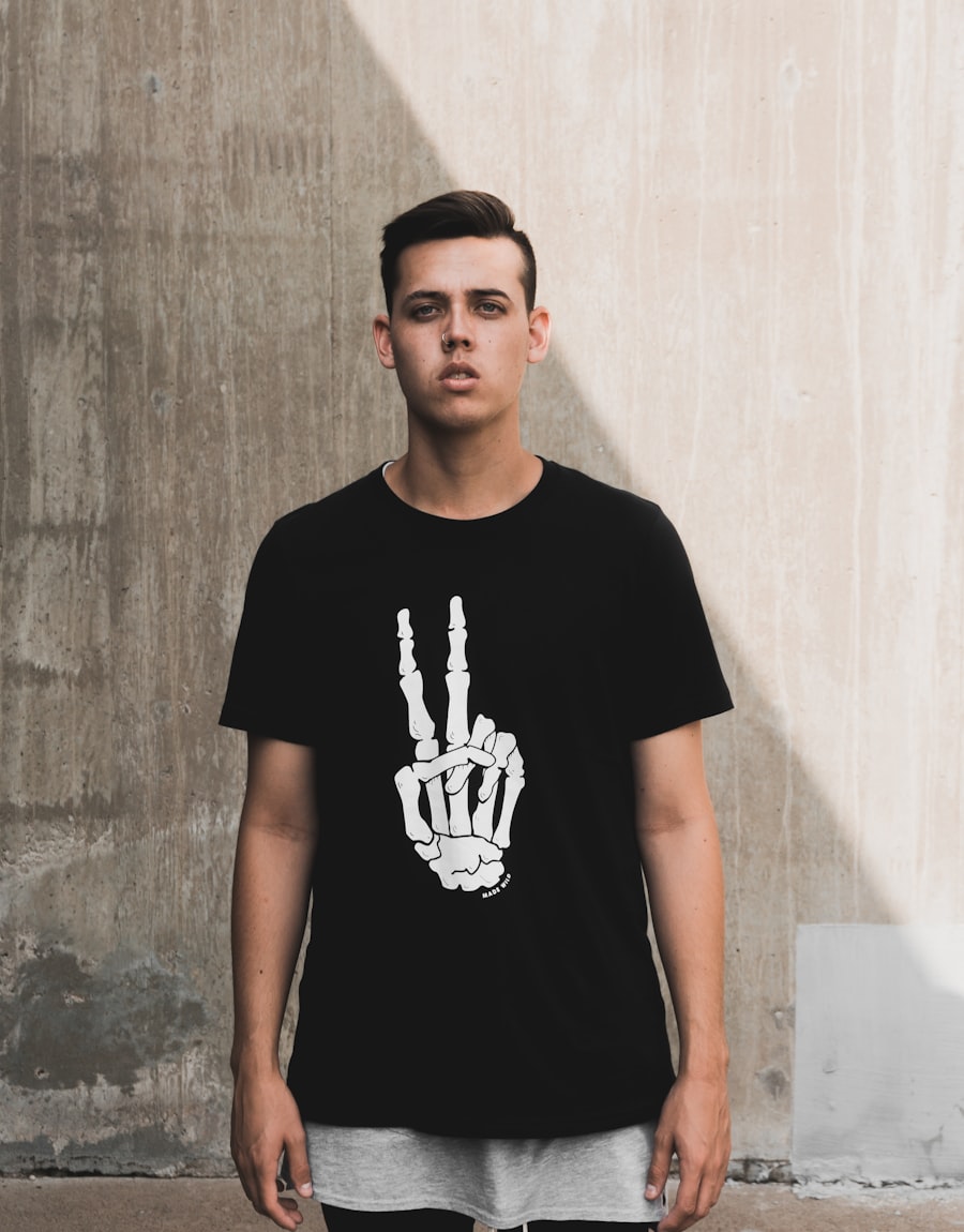 Man wearing a black tee from the Jup Essentials collection