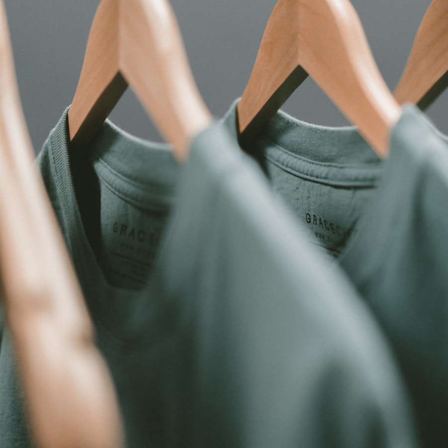 Jup hoodie in sage green on hangers